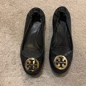 Black and gold Tory Burch Flats